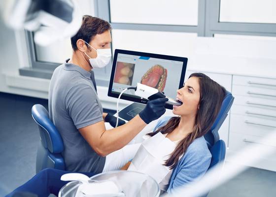 woman with her dentist using primescan